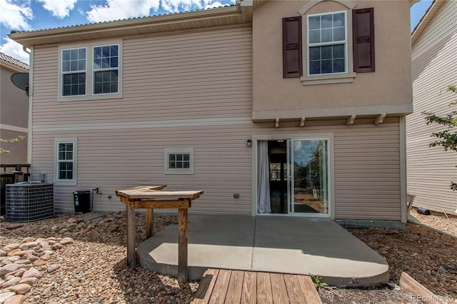 3607 Dinosaur St, Castle Rock, CO 80109 - back of property featuring central AC unit and a patio