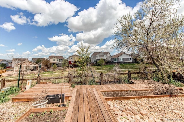 3607 Dinosaur St, Castle Rock, CO 80109 - view of yard featuring a residential view, a garden, a deck, and fence