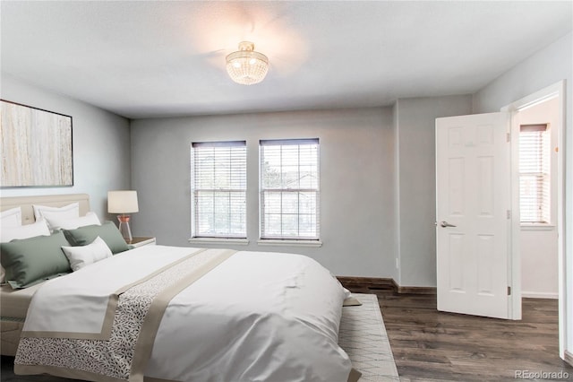 3607 Dinosaur St, Castle Rock, CO 80109 - bedroom featuring wood finished floors and baseboards