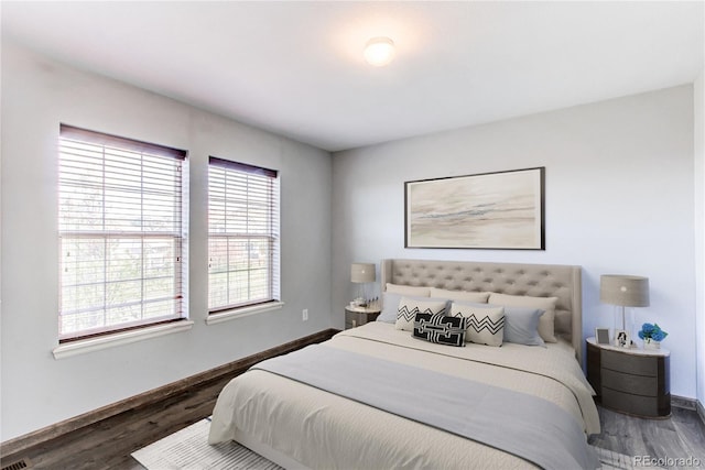 3607 Dinosaur St, Castle Rock, CO 80109 - bedroom featuring wood finished floors and baseboards