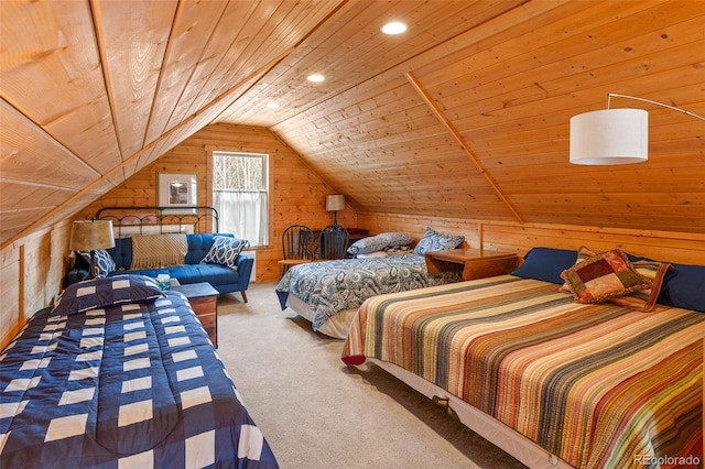 bedroom with lofted ceiling, wooden walls, wooden ceiling, and carpet flooring