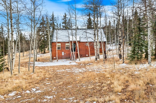 view of snow covered house