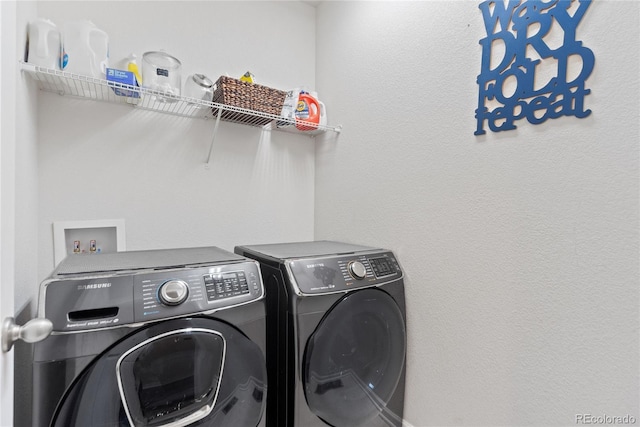 laundry room with independent washer and dryer