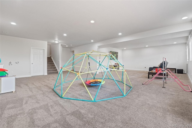 game room with carpet, recessed lighting, and baseboards