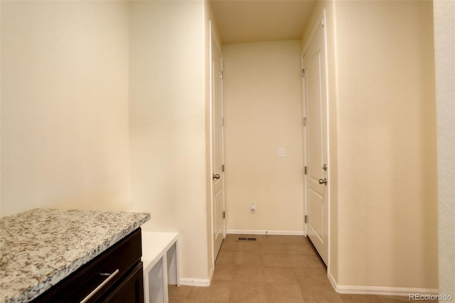 13351 Olive Way, Thornton, CO 80602 - corridor featuring baseboards