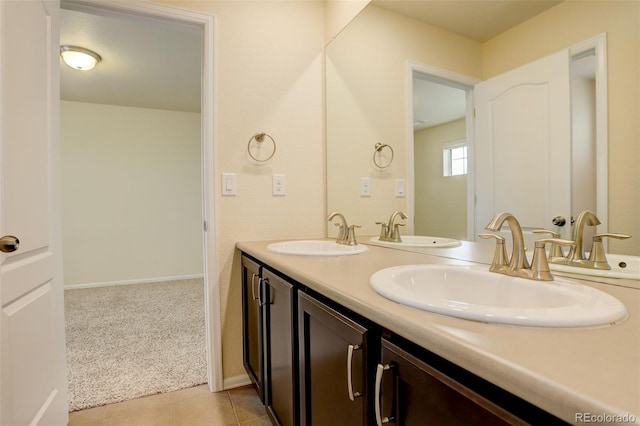 13351 Olive Way, Thornton, CO 80602 - full bathroom with double vanity and tile patterned floors
