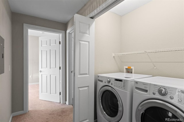 7440 S Blackhawk St Unit 104, Englewood, CO 80112 - washroom featuring washer and clothes dryer and carpet floors