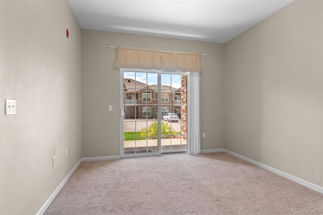 7440 S Blackhawk St Unit 104, Englewood, CO 80112 - carpeted spare room with baseboards
