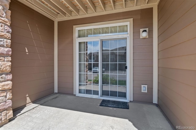 7440 S Blackhawk St Unit 104, Englewood, CO 80112 - entrance to property with a patio area
