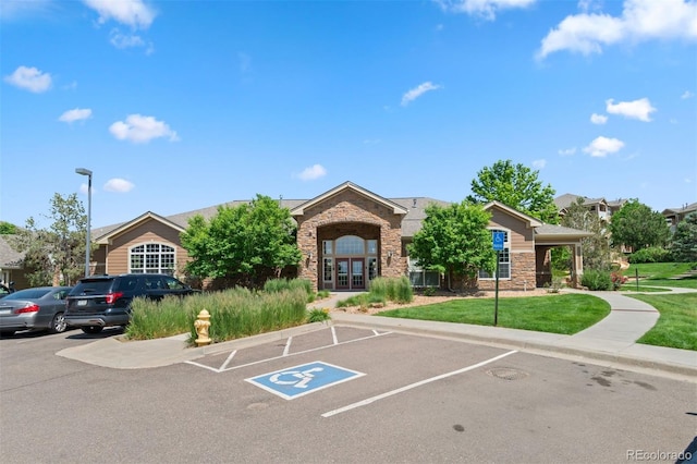 7440 S Blackhawk St Unit 104, Englewood, CO 80112 - view of property with uncovered parking