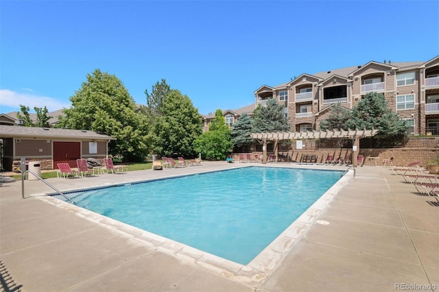7440 S Blackhawk St Unit 104, Englewood, CO 80112 - community pool featuring a patio area and a pergola