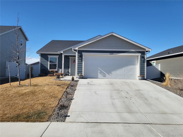 single story home featuring a garage