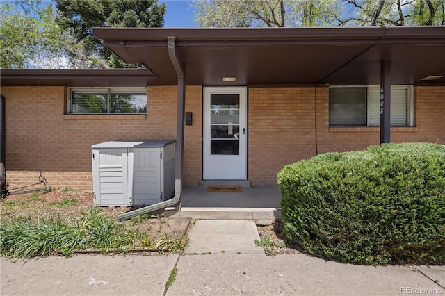 6004 S Prince St, Littleton, CO 80120 - entrance to property featuring brick siding