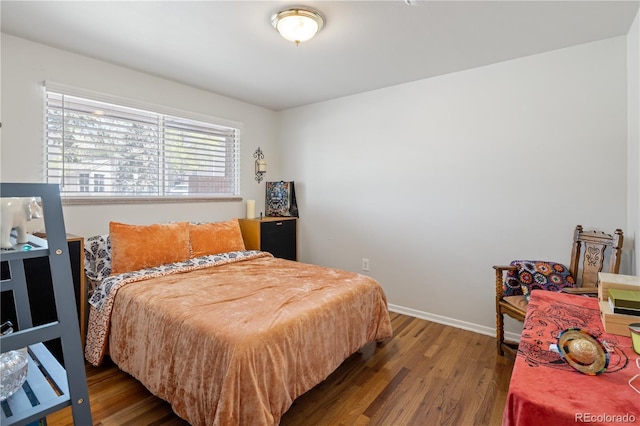 6004 S Prince St, Littleton, CO 80120 - bedroom with wood finished floors and baseboards