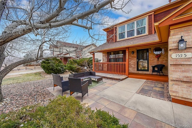 view of patio with an outdoor fire pit