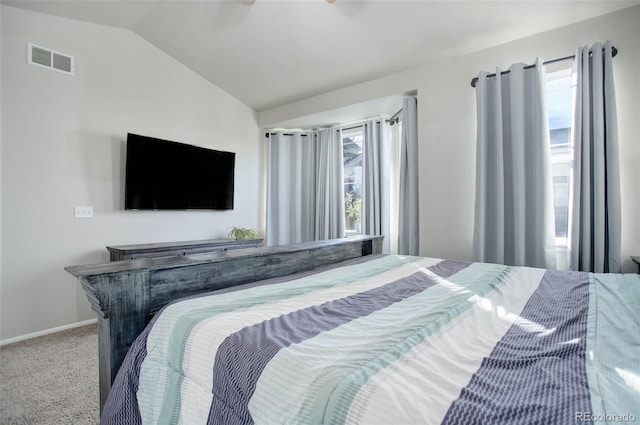 25525 E 1st Ave, Aurora, CO 80018 - carpeted bedroom with vaulted ceiling and multiple windows