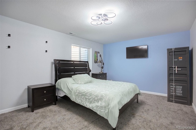 25525 E 1st Ave, Aurora, CO 80018 - bedroom with light colored carpet and a textured ceiling
