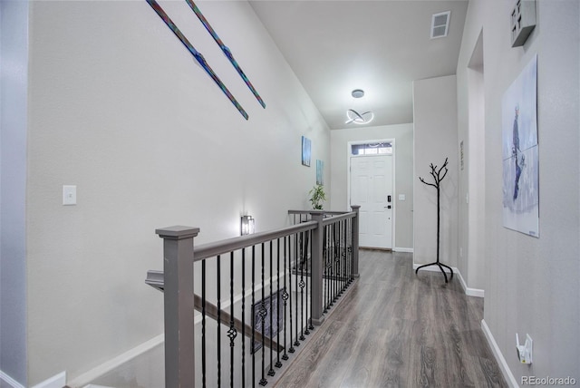 25525 E 1st Ave, Aurora, CO 80018 - hall featuring an upstairs landing and wood finished floors