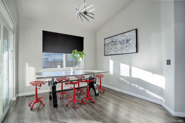 25525 E 1st Ave, Aurora, CO 80018 - dining room with wood finished floors and vaulted ceiling