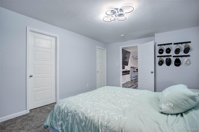 25525 E 1st Ave, Aurora, CO 80018 - carpeted bedroom with a textured ceiling