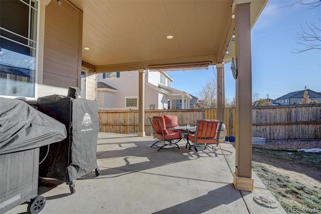 25525 E 1st Ave, Aurora, CO 80018 - fenced backyard with a patio area