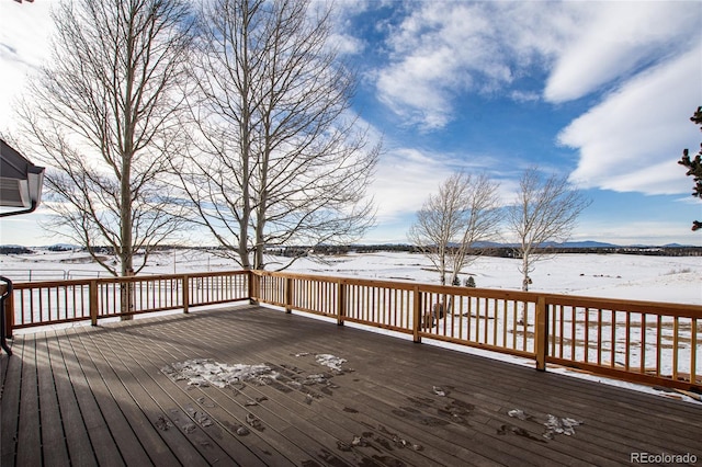 view of snow covered deck