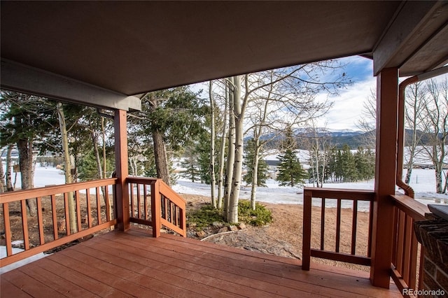 view of snow covered deck