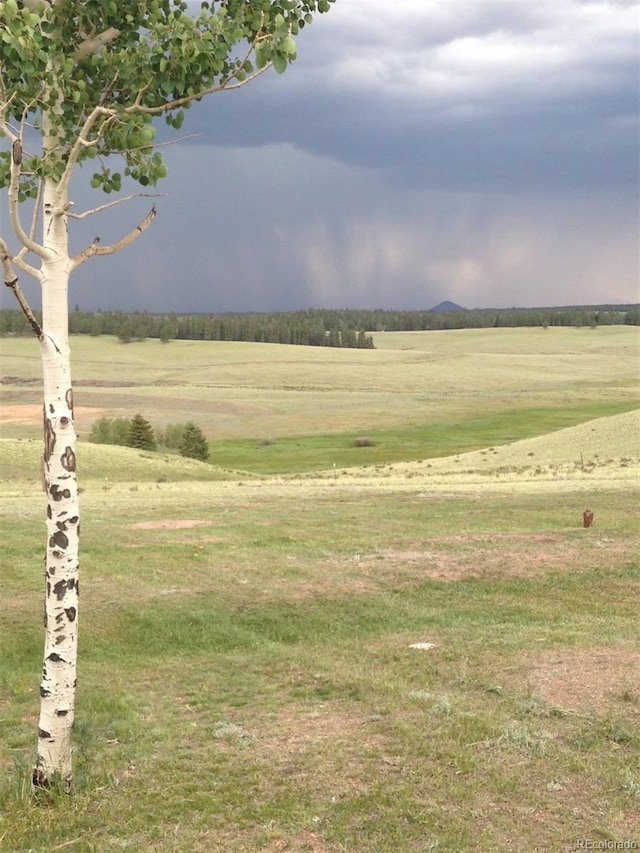 view of mountain feature with a rural view