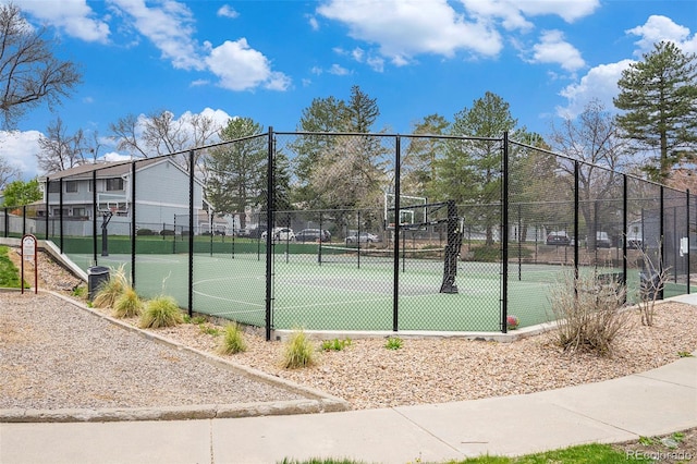 view of sport court with community basketball court and fence