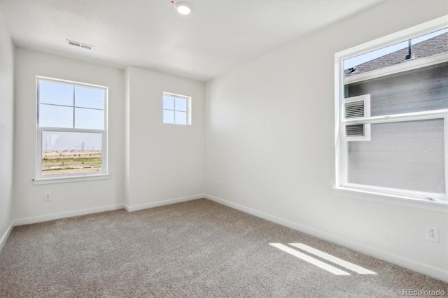 empty room with carpet flooring