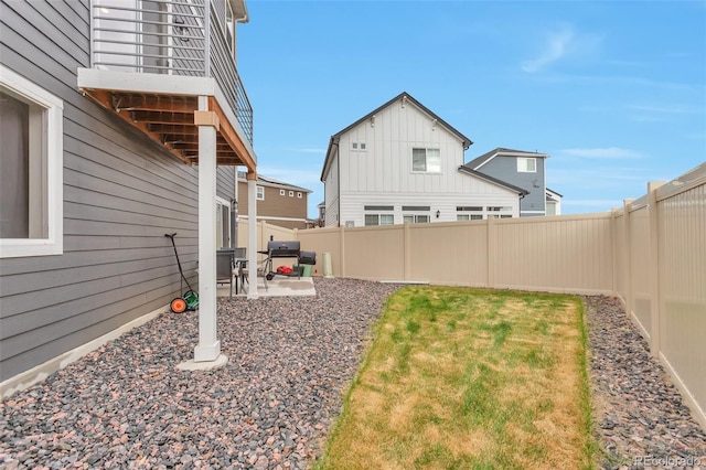 3963 N Quatar Ct, Aurora, CO 80019 - fenced backyard with a patio
