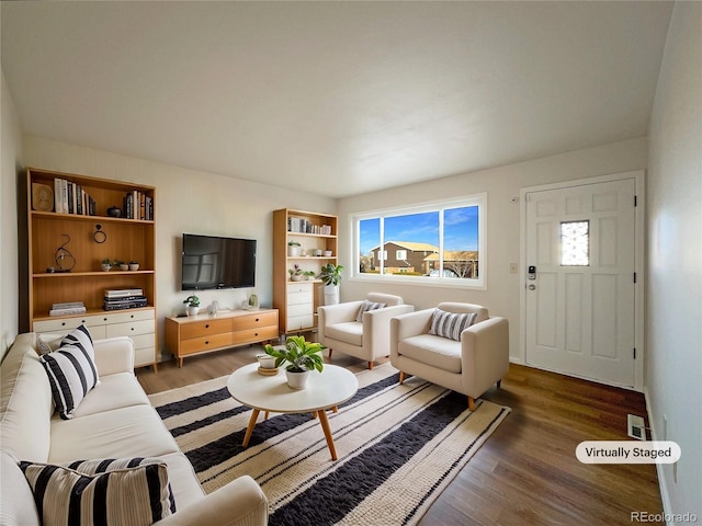 living room with dark wood-type flooring