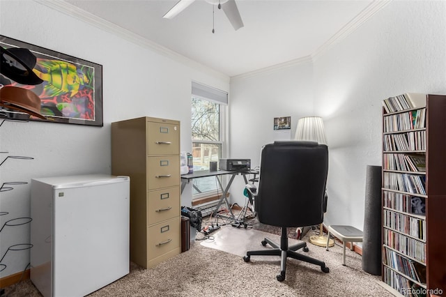 office space featuring a ceiling fan, ornamental molding, and carpet flooring