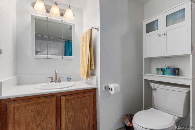 full bath with vanity and toilet