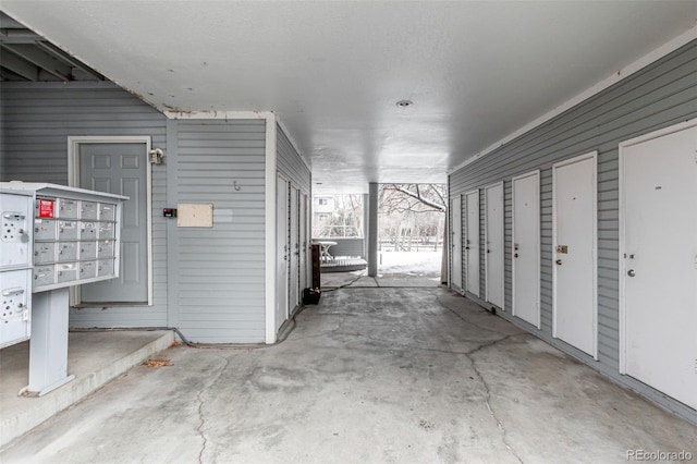 exterior space with unfinished concrete flooring