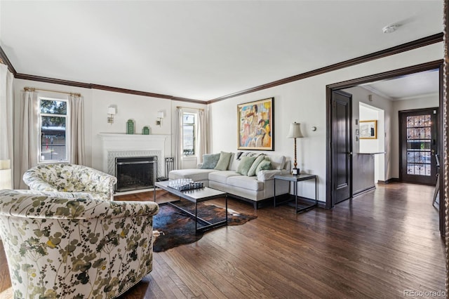 living room with dark wood-type flooring and ornamental molding