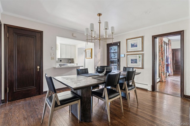 dining space featuring an inviting chandelier, a baseboard radiator, crown molding, and dark hardwood / wood-style flooring