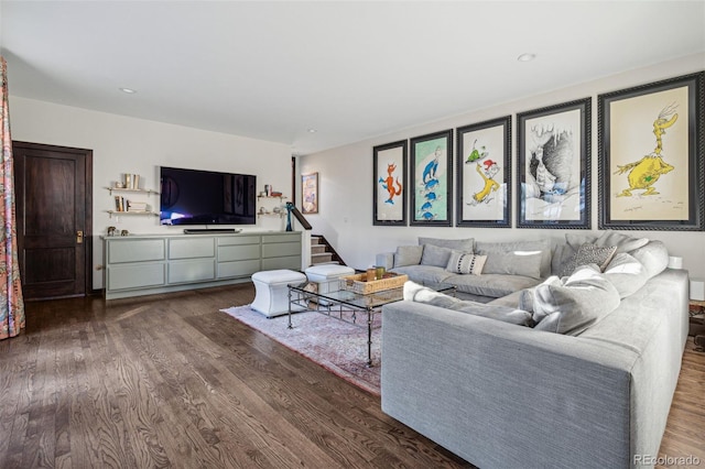 living room with dark hardwood / wood-style floors