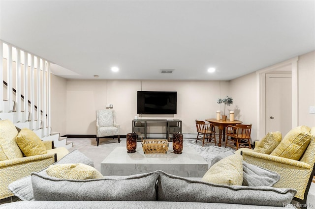 living room featuring a baseboard heating unit