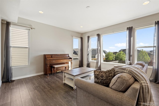 8235 Ryegate Way, Colorado Springs, CO 80908 - living room featuring dark wood-type flooring, baseboards, and recessed lighting