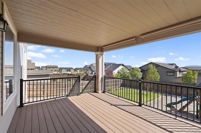8235 Ryegate Way, Colorado Springs, CO 80908 - wooden terrace with a residential view and a fenced backyard