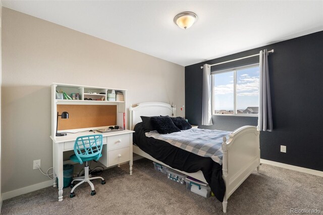8235 Ryegate Way, Colorado Springs, CO 80908 - bedroom featuring light colored carpet and baseboards