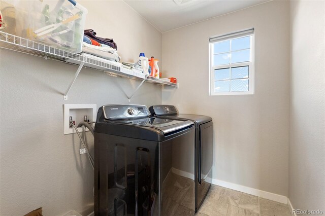 8235 Ryegate Way, Colorado Springs, CO 80908 - washroom with separate washer and dryer and baseboards