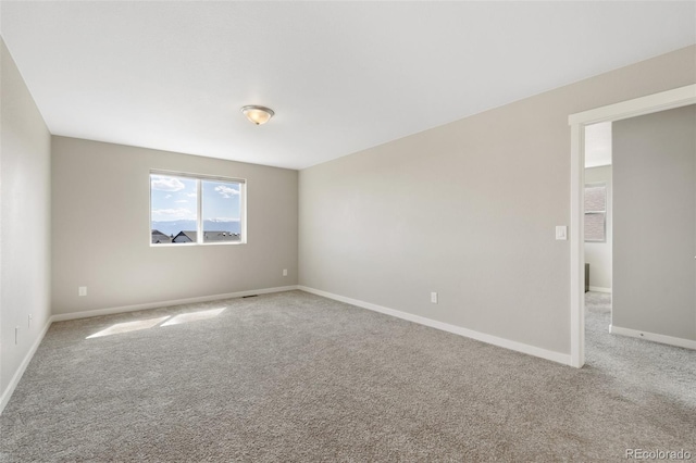 8235 Ryegate Way, Colorado Springs, CO 80908 - spare room featuring carpet floors and baseboards