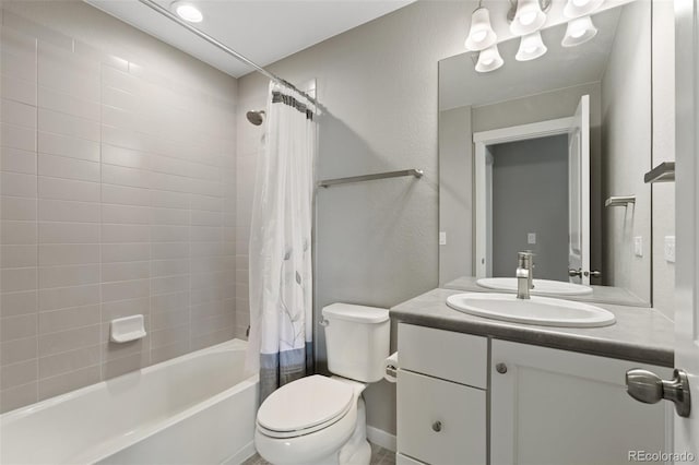 8235 Ryegate Way, Colorado Springs, CO 80908 - full bathroom featuring toilet, shower / bath combo with shower curtain, vanity, and a textured wall