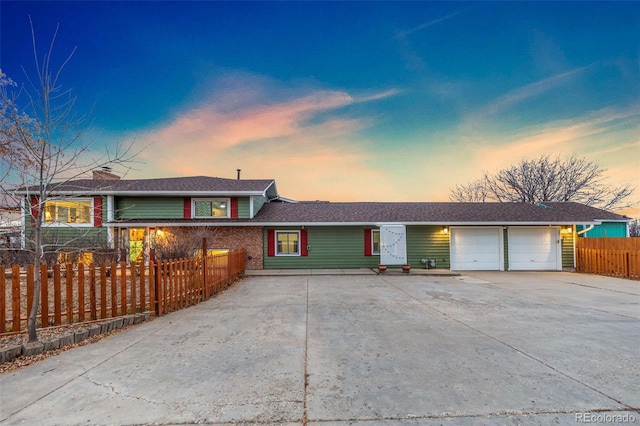 single story home with a garage