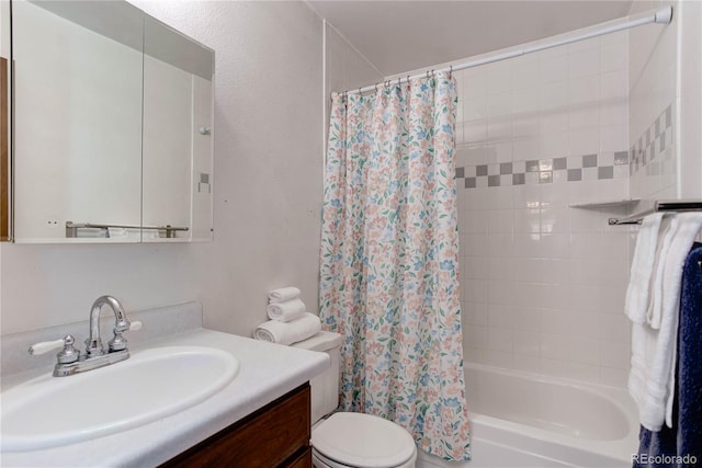 full bathroom featuring vanity, toilet, and shower / bath combo with shower curtain