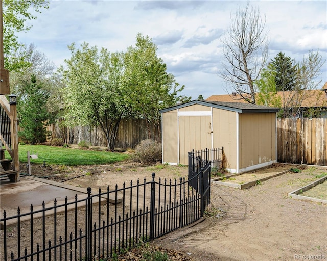 view of shed with a fenced backyard