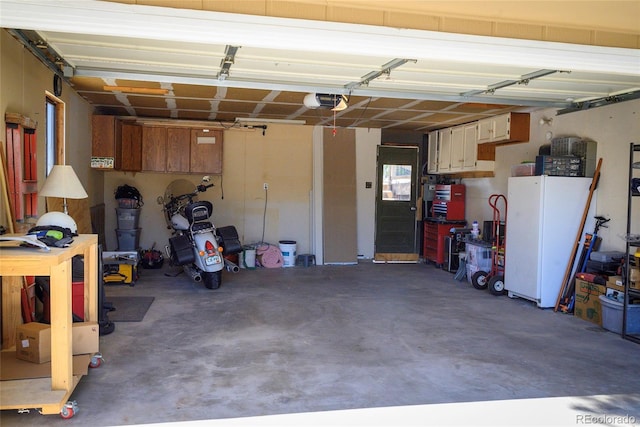 garage featuring a garage door opener