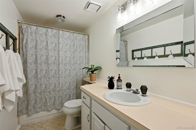 full bathroom with vanity, toilet, and shower / tub combo with curtain